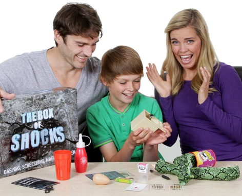 Family playing with their Box of Shocks from Drumond Park