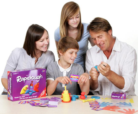 Family playing with their New Family Rapidough Game