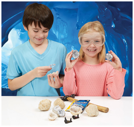 Boy and girl playing with their Geode Discovery Kit