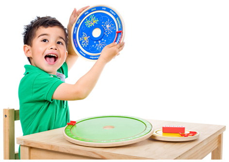 A boy playing with his Circa Calendar