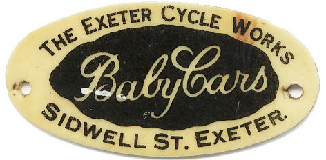 A plastic label that used to be attached to those baby carriages sold at Exeter Cycle Works