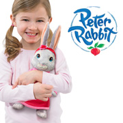 Girl holding a Lily Bobtail soft toy